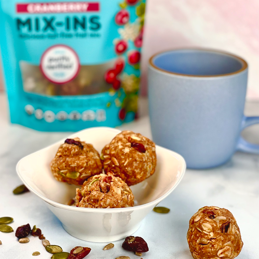 gluten free cranberry muesli protein balls in a bowl