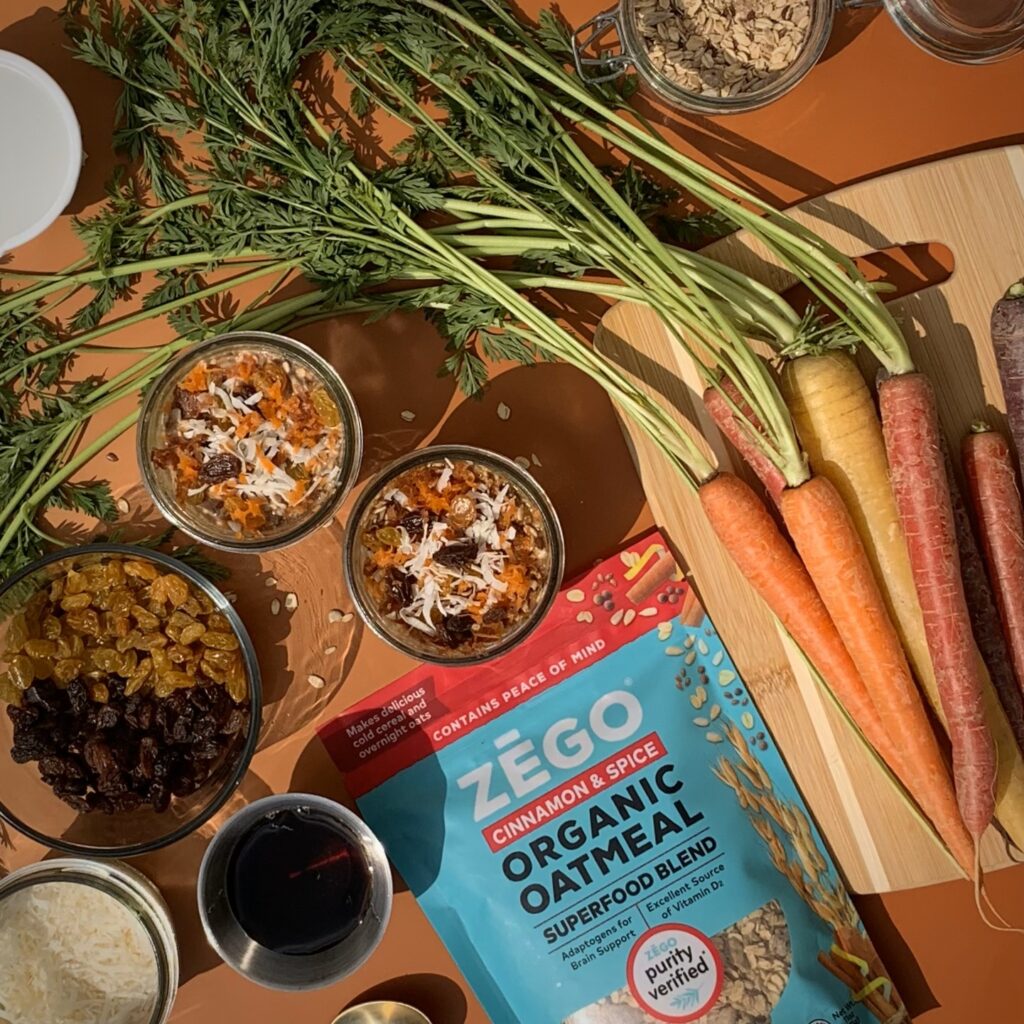 ZEGO Gluten-Free Carrot Cake Overnight Oats with fresh shredded carrots, raisins, and shredded coconut. 